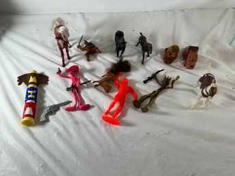 Animal And Cowboy Figurines