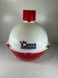 The Big Bobber Floating Cooler, Designed To Look Like A Traditional Red And White Fishing Bobber