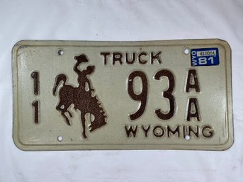 Vintage 1982 Wyoming Truck License Plate Featuring The Iconic Bucking Bronco And Rider Symbol