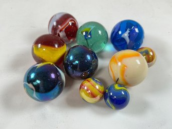 10 Glass Marbles In Styles Such As Swirls And Cat's Eyes, Large And Small Marbles, See Photos