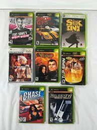 8 XBOX Games Including Tony Hawks American Wasteland, GT2002, Goldeneye Rouge Agent, Etc