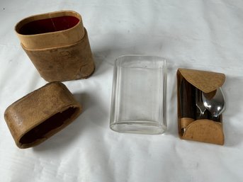 Vintage Travel Set Featuring A Clear Glass Container With Folding Utinsels Housed Within Leather Case