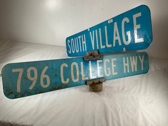 Vintage Blue Metal Street Signs Featuring The Text 'SOUTH VILLAGE' And '796 COLLEGE HWY'