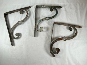 3 Antique Cast Iron Shelf Brackets With A Decorative Scroll Design