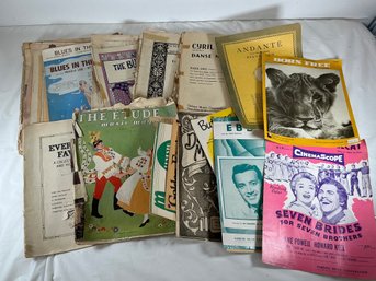 Vintage Sheet Music From Various Eras, Such As A 1954 'Seven Brides For Seven Brothers' Movie Vocal Score