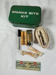 Vintage Snake Bite Kit Features A Green Metal Tin