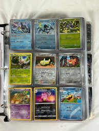 Binder Filled With Pokémon  Cards And Baseball Cards