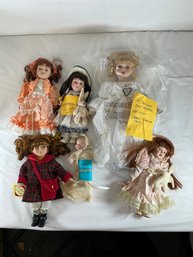 Vintage Porcelain Dolls Including Grace Guardian Angel, Easter Bunny Dolls, And More