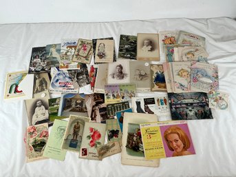 Vintage Paper Ephemera, Primarily Consisting Of Early-20th-century Greeting Postcards, Advertising Trade Cards