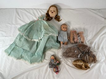 Vintage And Antique Doll Parts And Components, Including A Detached Doll Head With Red Hair