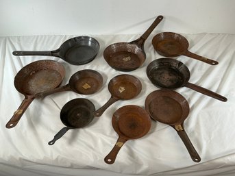 10 Vintage Cowboy Skillets Of Various Sizes