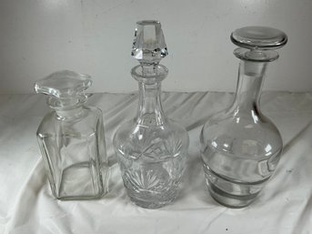 Three Vintage Clear Glass And Crystal Decanters With Matching Stoppers