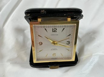 Vintage Carina 8-day 15-jewel Swiss-made Travel Alarm Clock In A Black Leather Folding Case.