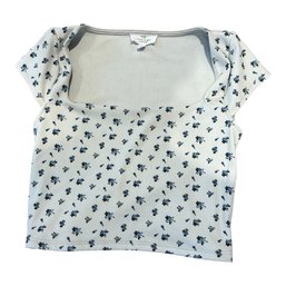 Live In TheLive In The Moment Sweetheart Neck Crop Top Featuring A Ribbed Texture And A Delicate Blue Floral P