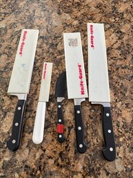 Chef Cutlery (2), Zwilllnig J.A. Henckles (2), And Mundial Chef Knifes With Guards