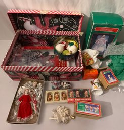 Vintage Christmas Ornaments And Decor In Box With Candle And Tree Toppers