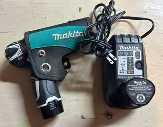 Makita 3/8 Inch 12 Volt Drill FD02 With Holster, Extra Battery And Battery Charger