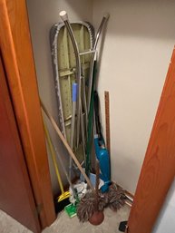 Cleaning Supplies And Ironing Board In Hall Closet