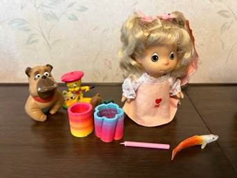 Oliver & Company, Tweety Bird Painter, Mini Multi Colored Slinkies, And Doll With Koi Fish
