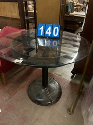 Heavy Industrial Wagon Wheel Display With 40in Glass Top Table