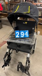 Kanga TS Rolling Wheel Chair With Eating Tray And Sun Shade Buggy Form Hood