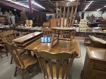 Solid Oak 67' Dinning Table And 6 Chairs With 2 12' Leafs