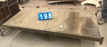 Antique Industrial Moving Cart With Heavy Steel Wheels And Vintage Wood Floor, 3'x6'