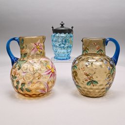 Two American Enamelled Glass Pitchers And A Jar, Late 19th Century