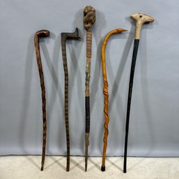 Five Native American And Folk Art Carved And Painted Wood Walking Sticks And Canes, 19th And 20th Century
