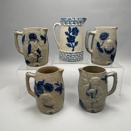 Four White's Utica Saltglaze Pitchers And A Sponged Pitcher
