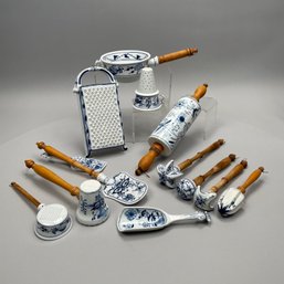 Thirteen Porcelain 'Blue Onion' Serving Utensils