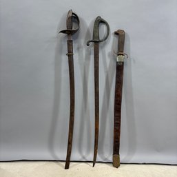 Three Continental Brass, Steel And Leather Swords