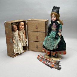 Three Dolls And A Doll's Travelling Trunk