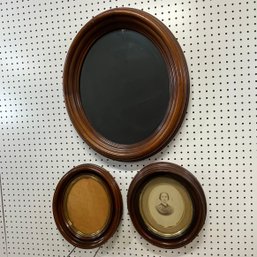 Two American Walnut Oval Frames And A Mirror
