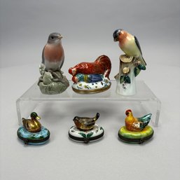 Two Continental Porcelain Figures And Four Boxes, 20th Century