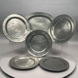 Five British Pewter Chargers And A Platter