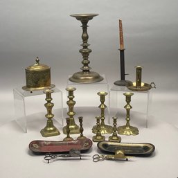 Dutch Brass Table-Top Tobacco Box And A Group Of Candlesticks And Trays