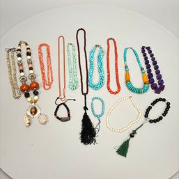 Fourteen Necklaces And Bracelets, Including Turquoise And Coral Examples