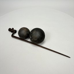 Two Cast-Iron Cannon Balls And A Bayonet