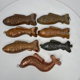 Seven Tin-Lined Copper Fish Molds, Two German, 20th Century