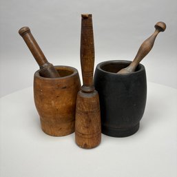 Two Treen Mortars And Three Pestles