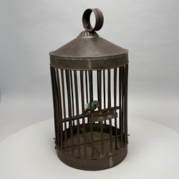 Modern Metal Birdcage Housing A Carved And Painted Figure Of A Parrot