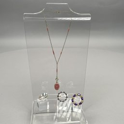 Group Of Jewelry Comprising A 14k Enamel Necklace, Two 14k Pins And A Ring