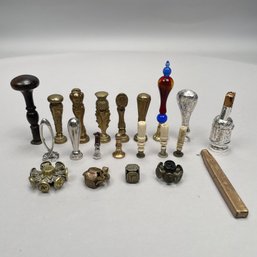 Nineteen Seals, A Match Holder And A Candle