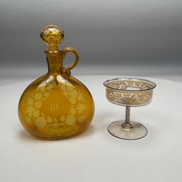 Venetian Gilt And Enamelled Champagne And A Cut And Engraved Amber Glass Decanter