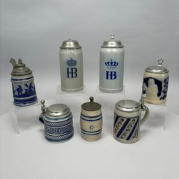 Seven German Cobalt Blue-Decorated Saltglaze Stoneware Steins With Pewter Lids, Late 19th-20th Century