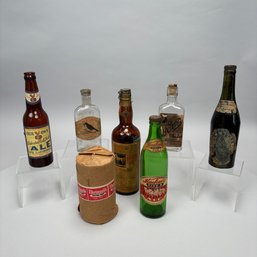 Six American Whiskey And Ale Glass Bottles, And A Full Sleeve Of Coasters, Late 19th To Mid-20th Century