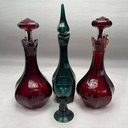 Pair Of Bohemian Ruby Glass Decanters, A Single English Emerald Green Decanter And A Wine Glass, 19th Century