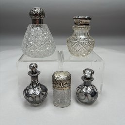 Five English And American Sterling Silver And Colorless Cut Glass Bottles, Late 19th-Early 20th Century