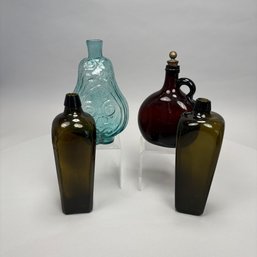 Four American Glass Utilitarian Bottles, 19th Century